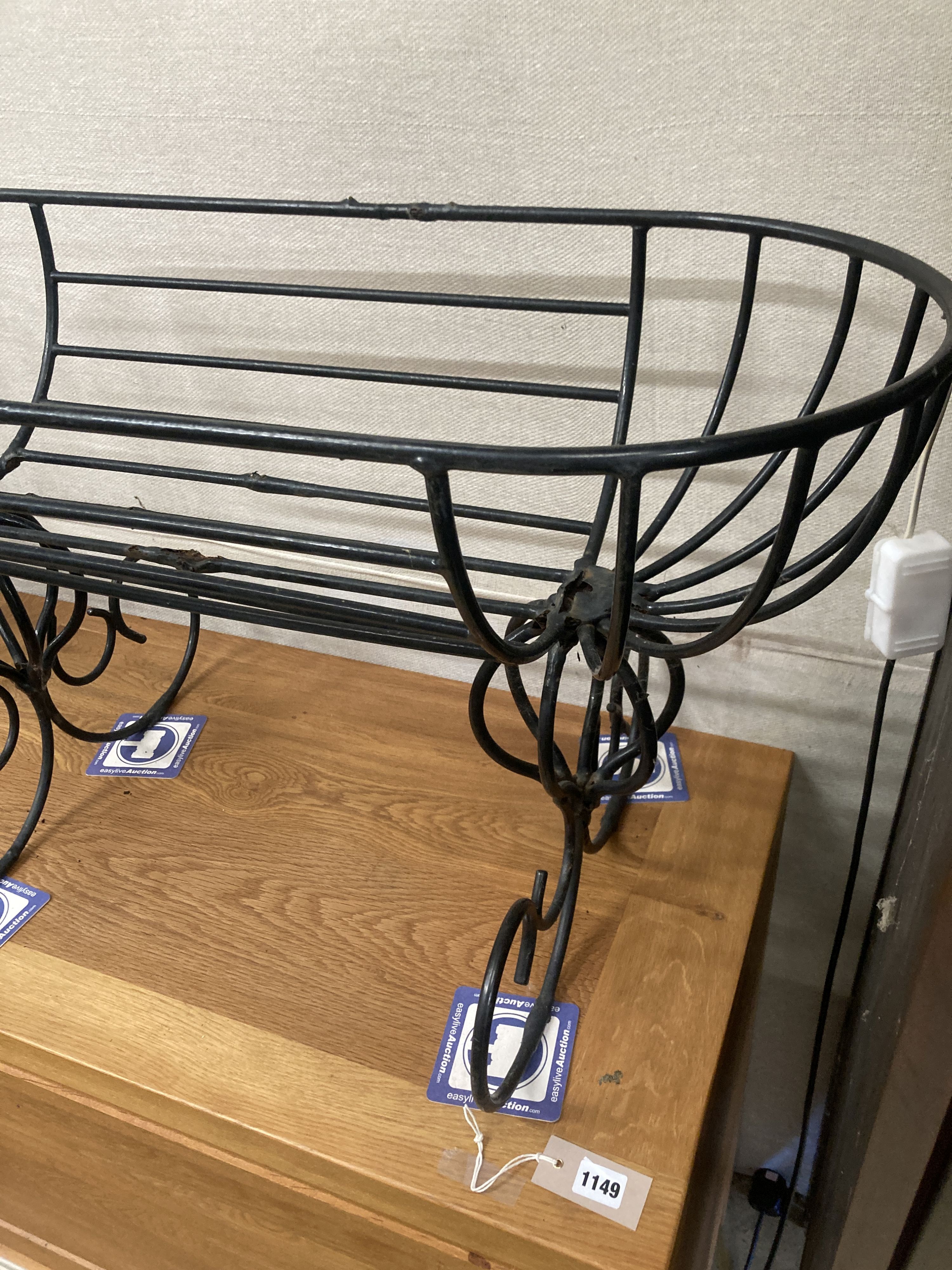 Two painted wrought iron planters, larger width 91cm, depth 38cm, height 50cm